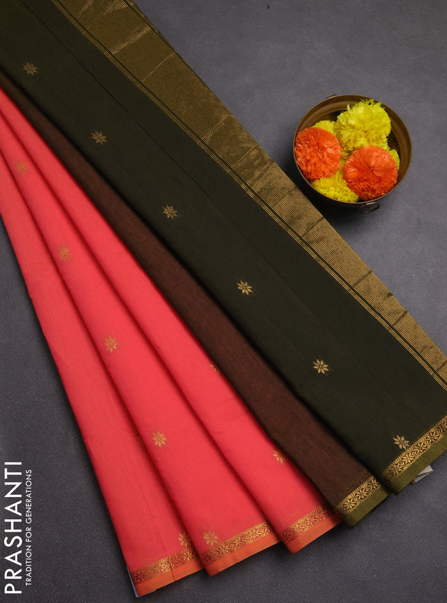 Semi maheswari cotton saree peach shade and sap green with allover zari woven buttas and small zari woven border
