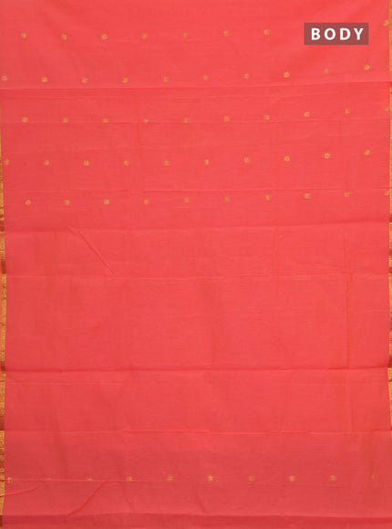 Semi maheswari cotton saree peach shade and sap green with allover zari woven buttas and small zari woven border