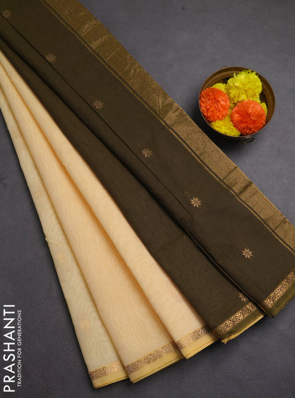 Semi maheswari cotton saree pale yellow and olive green with allover zari woven buttas and small zari woven border