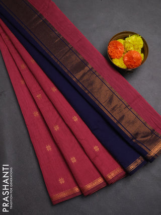 Semi maheswari cotton saree pink and navy blue with allover copper zari woven buttas and small copper zari woven border