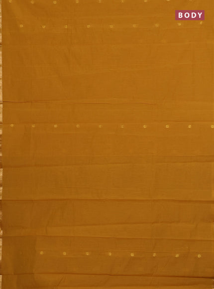 Semi maheswari cotton saree mustard yellow and green with allover zari woven buttas and small zari woven border