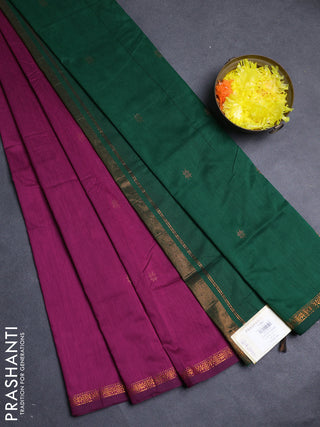 Semi maheswari cotton saree magenta pink and bottle with allover copper zari woven buttas and small copper zari woven border