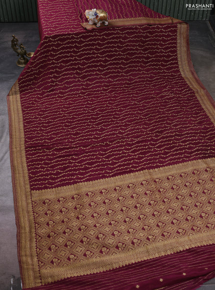 Banarasi semi crepe saree wine shade with allover geometric weaves and woven border