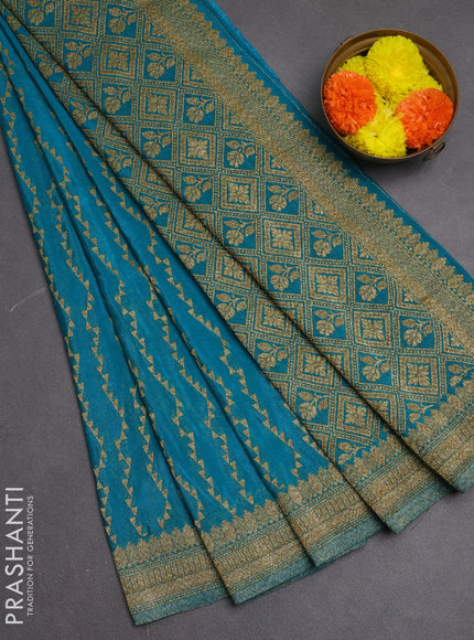 Banarasi semi crepe saree teal blue with allover geometric weaves and woven border