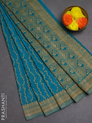 Banarasi semi crepe saree teal blue with allover geometric weaves and woven border