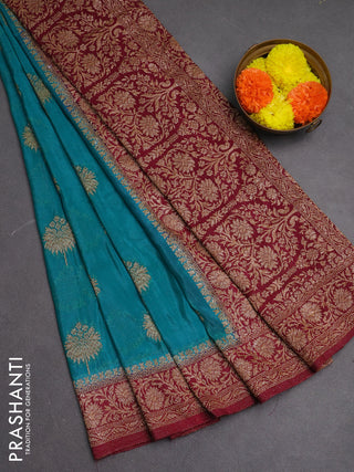 Banarasi semi crepe saree teal blue and dark pink with woven buttas and woven border
