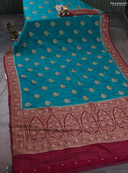 Banarasi semi crepe saree teal blue and dark pink with woven buttas and woven border
