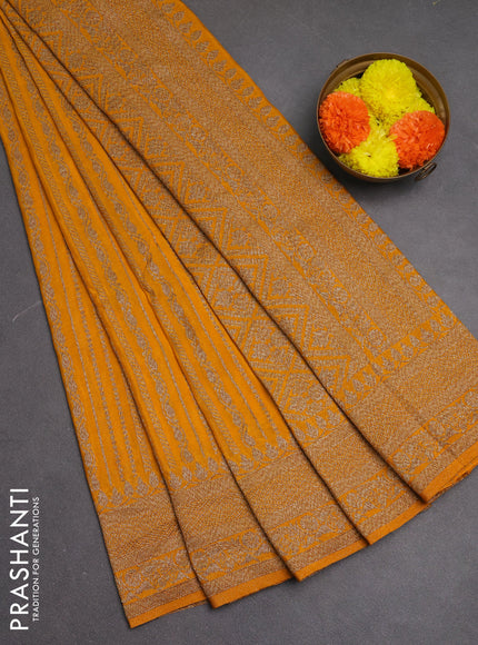 Banarasi semi crepe saree mango yellow with allover thread & zari weaves and woven border