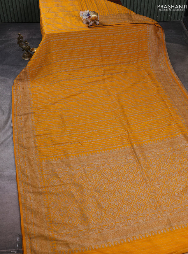 Banarasi semi crepe saree mango yellow with allover thread & zari weaves and woven border