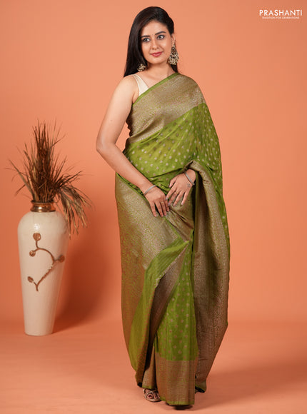 Banarasi semi crepe saree light green with woven buttas and woven border
