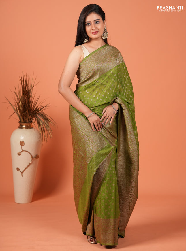 Banarasi semi crepe saree light green with woven buttas and woven border