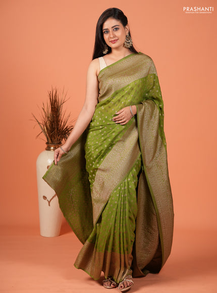 Banarasi semi crepe saree light green with woven buttas and woven border