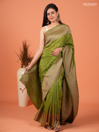 Banarasi semi crepe saree light green with woven buttas and woven border