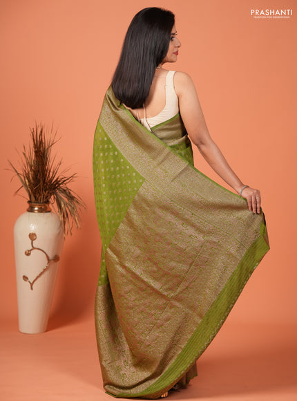Banarasi semi crepe saree light green with woven buttas and woven border
