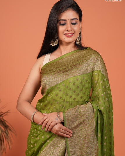 Banarasi semi crepe saree light green with woven buttas and woven border