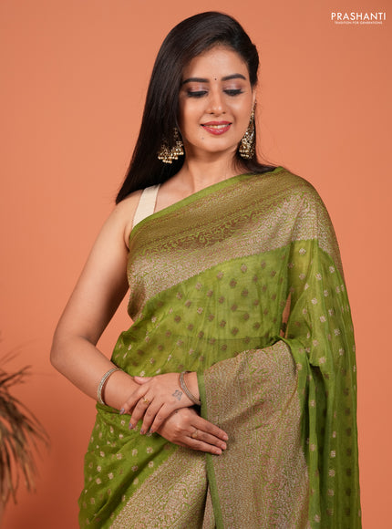 Banarasi semi crepe saree light green with woven buttas and woven border