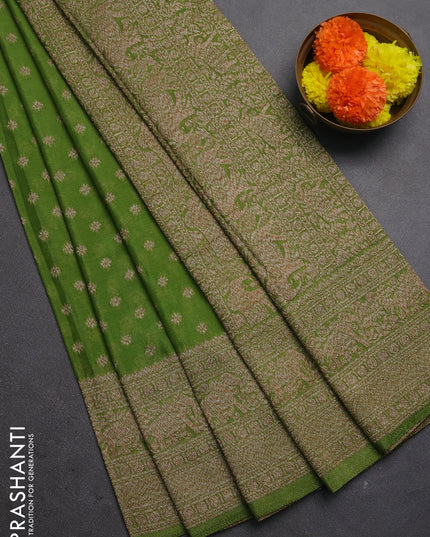 Banarasi semi crepe saree light green with woven buttas and woven border