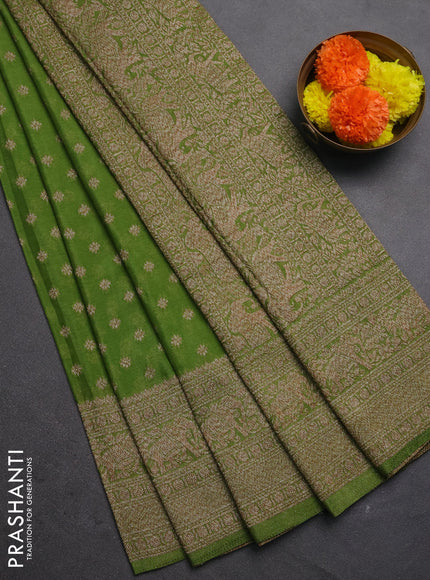 Banarasi semi crepe saree light green with woven buttas and woven border