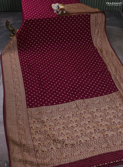 Banarasi semi crepe saree wine shade with woven buttas and woven border