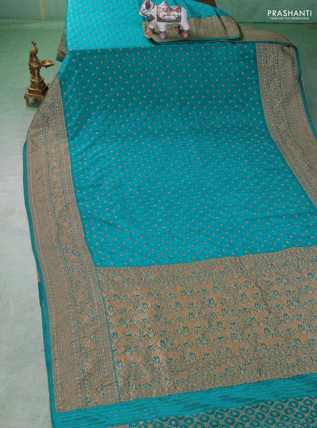 Banarasi semi crepe saree teal blue with woven buttas and woven border
