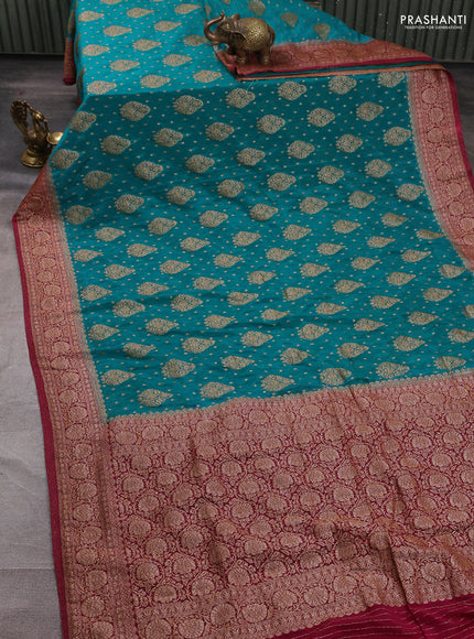 Banarasi semi crepe saree teal blue and dark pink with woven buttas and woven border