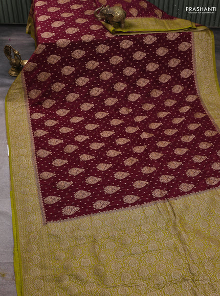 Banarasi semi crepe saree wine shade and lime green with woven buttas and woven border