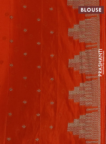 Banarasi semi crepe saree orange with woven buttas and woven border