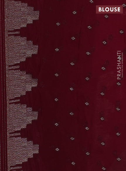 Banarasi semi crepe saree wine shade with woven buttas and woven border