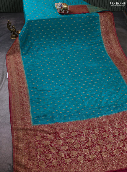 Banarasi semi crepe saree teal blue and dark pink with woven buttas and woven border