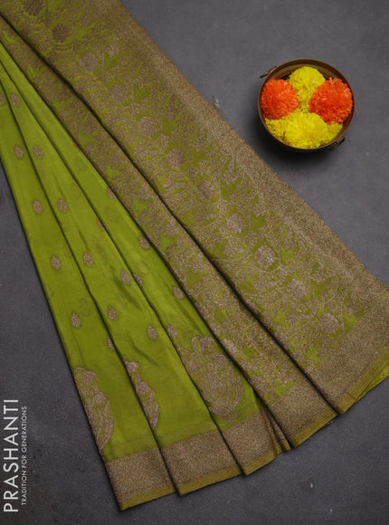 Banarasi semi crepe saree light green with woven buttas and woven border