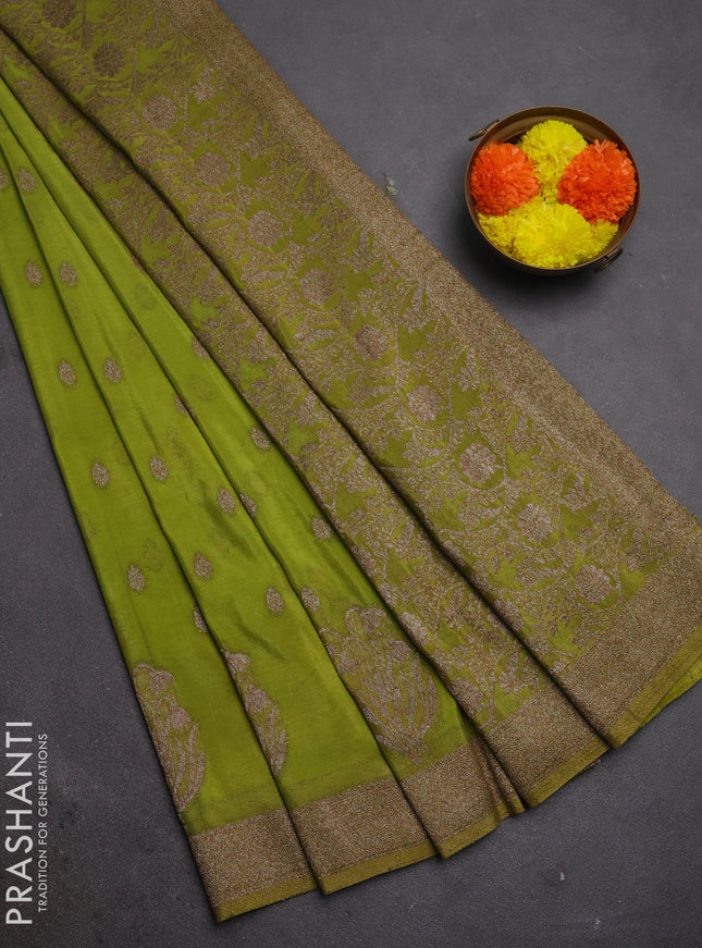 Banarasi semi crepe saree light green with woven buttas and woven border
