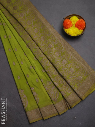 Banarasi semi crepe saree light green with woven buttas and woven border