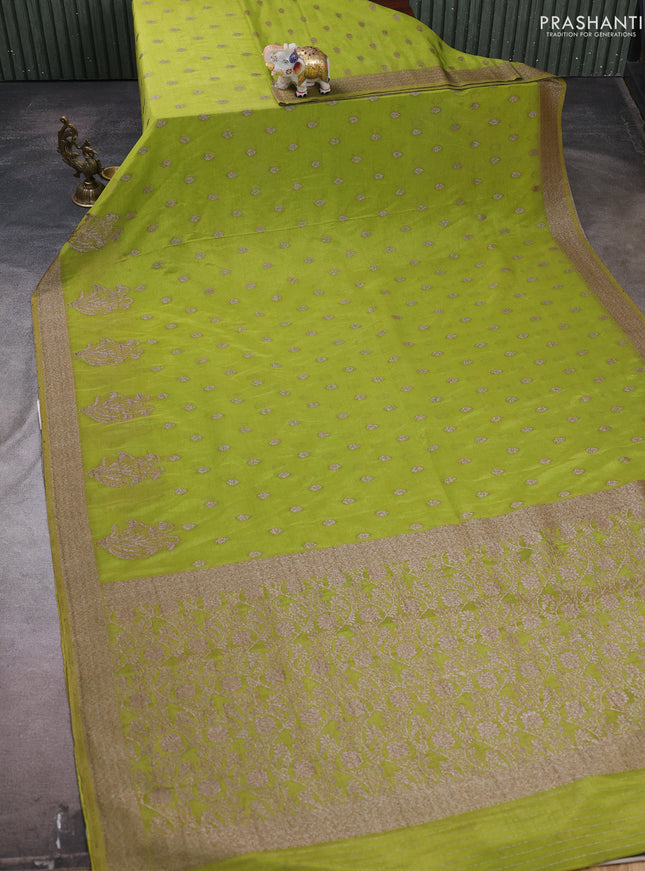Banarasi semi crepe saree light green with woven buttas and woven border