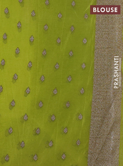 Banarasi semi crepe saree light green with woven buttas and woven border