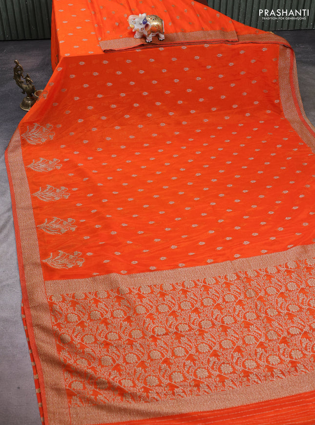 Banarasi semi crepe saree orange with woven buttas and woven border