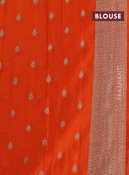 Banarasi semi crepe saree orange with woven buttas and woven border