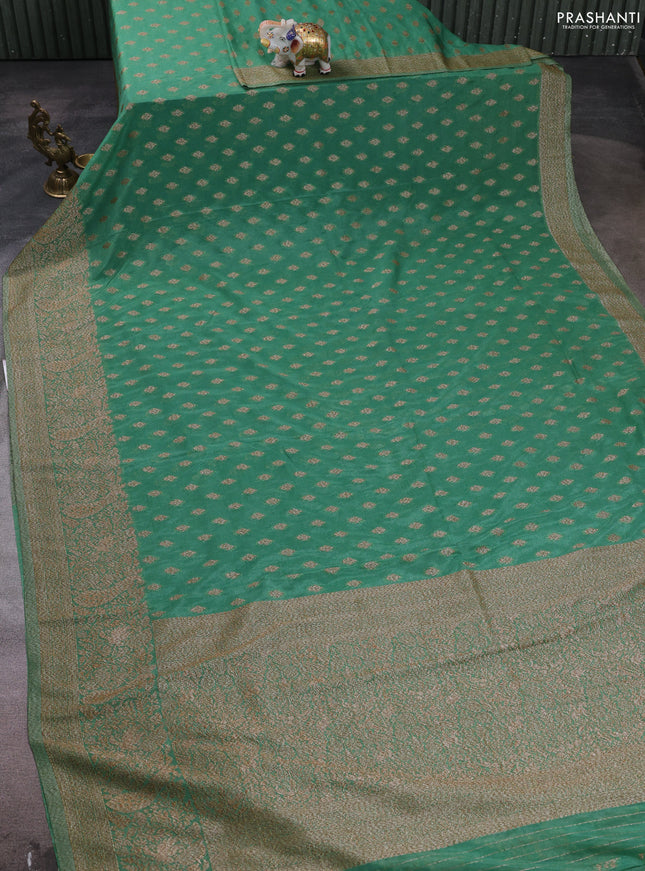 Banarasi semi crepe saree pastel green with woven buttas and woven border