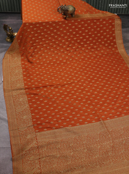 Banarasi semi crepe saree rustic orange with woven buttas and woven border