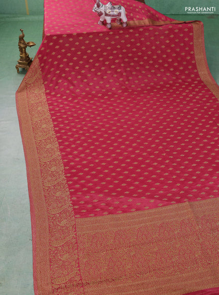 Banarasi semi crepe saree pink shade with woven buttas and woven border