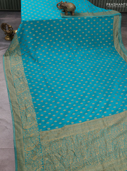Banarasi semi crepe saree teal blue with woven buttas and woven border
