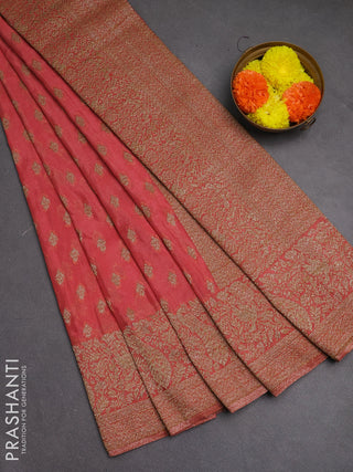 Banarasi semi crepe saree peach shade with woven buttas and woven border