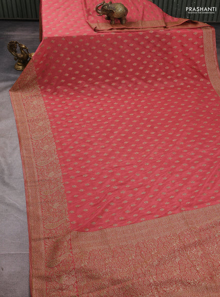 Banarasi semi crepe saree peach shade with woven buttas and woven border
