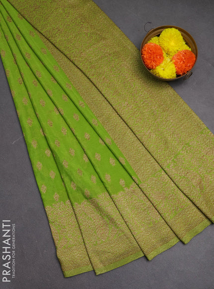 Banarasi semi crepe saree light green with woven buttas and woven border