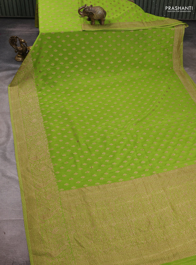 Banarasi semi crepe saree light green with woven buttas and woven border
