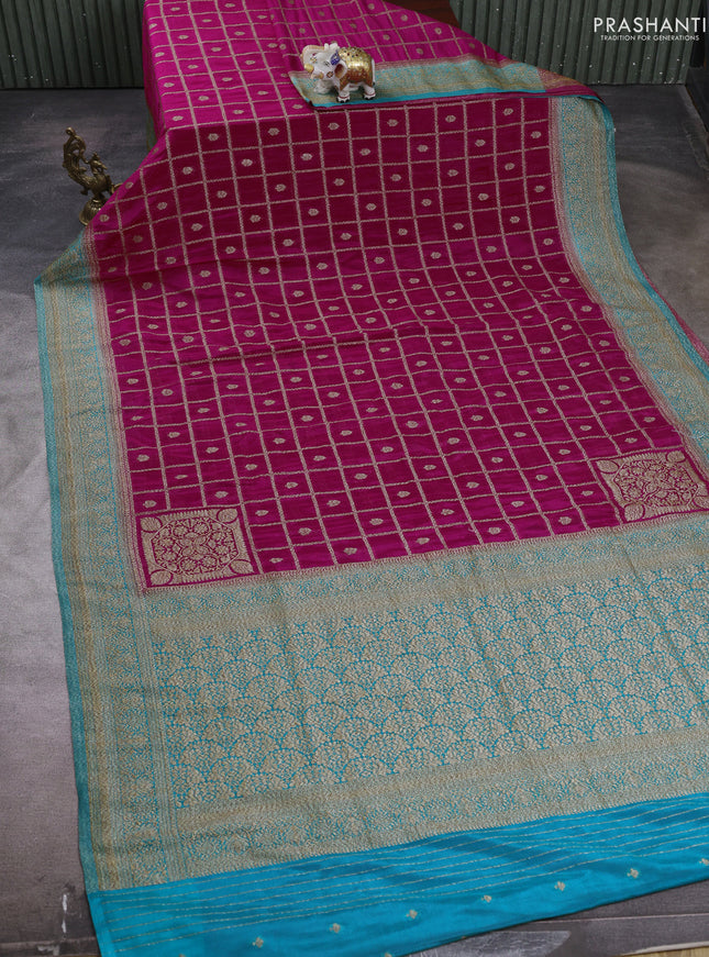 Banarasi semi crepe saree pink and teal blue with allover checks & buttas and woven border