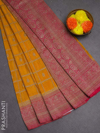 Banarasi semi crepe saree mustard yellow and pink with allover checks & buttas and woven border