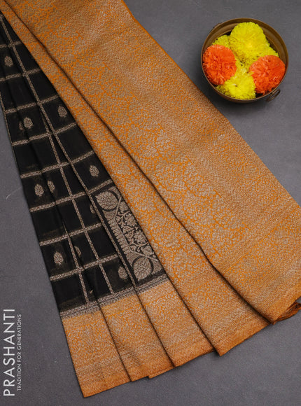 Banarasi semi crepe saree black and mustard yellow with allover checks & buttas and woven border