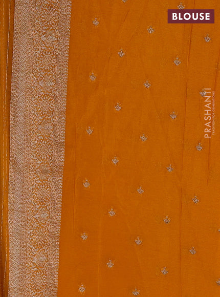 Banarasi semi crepe saree black and mustard yellow with allover checks & buttas and woven border