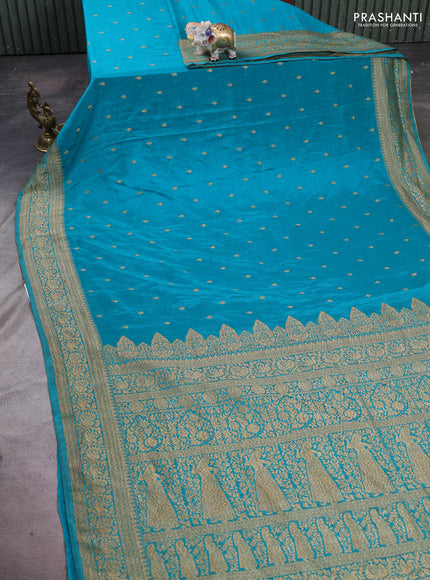 Banarasi semi crepe saree teal blue with woven buttas and woven border