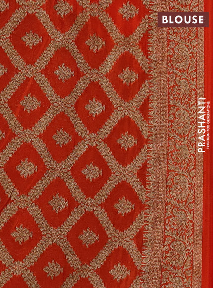 Banarasi semi crepe saree orange with woven buttas and woven border